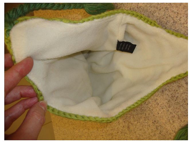 Autre Marque Bonnet en laine tricoté multicolore avec pompons - vue 4