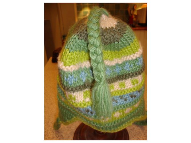 Autre Marque Bonnet en laine tricoté multicolore avec pompons - vue 5