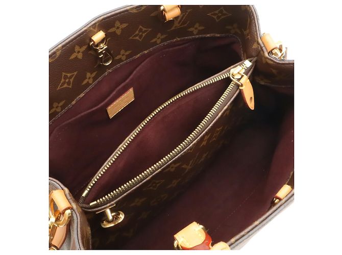 mala Louis Vuitton Monogram Montaigne MM - vista 7