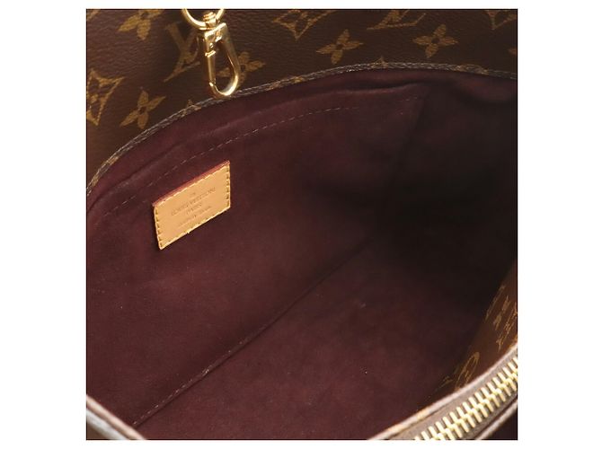 mala Louis Vuitton Monogram Montaigne MM - vista 8