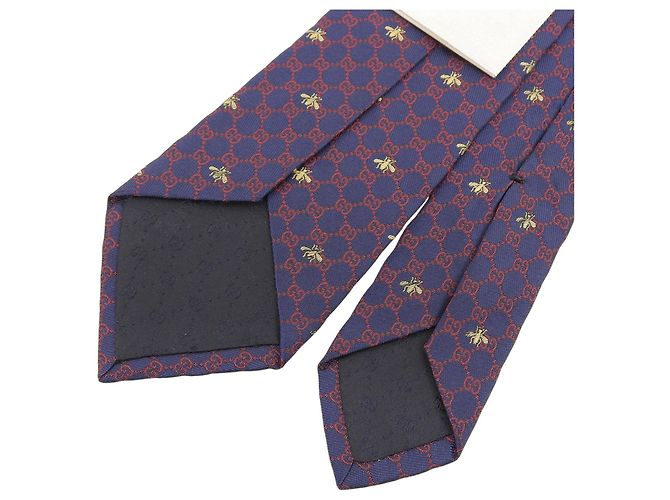 Cravatta in seta GUCCI con logo GG e ricamo ape - vista 4
