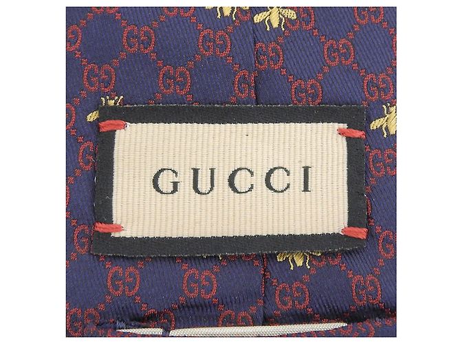 Cravatta in seta GUCCI con logo GG e ricamo ape - vista 6
