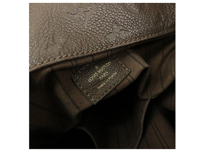 Borsa a mano Louis Vuitton Monogram Empreinte Artsy MM Terre M94171 - vista 19