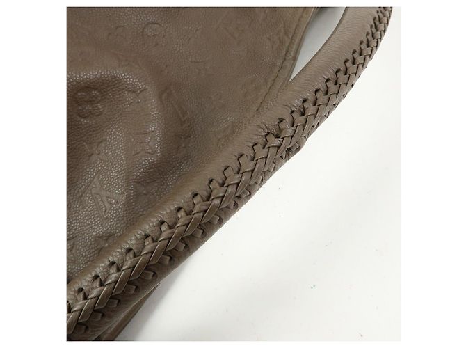 Borsa a mano Louis Vuitton Monogram Empreinte Artsy MM Terre M94171 - vista 7