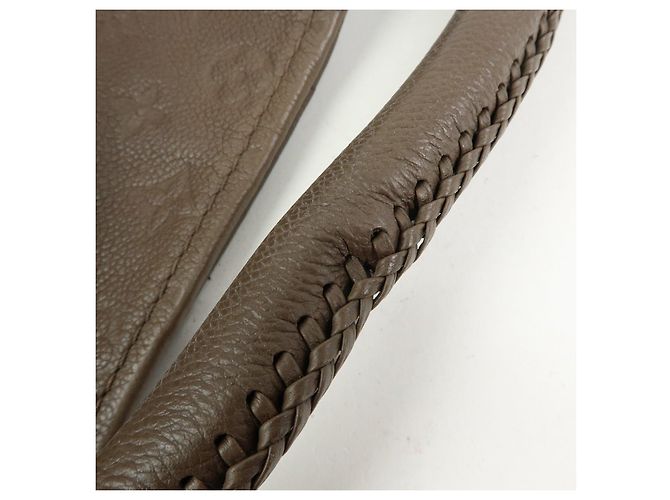 Borsa a mano Louis Vuitton Monogram Empreinte Artsy MM Terre M94171 - vista 8
