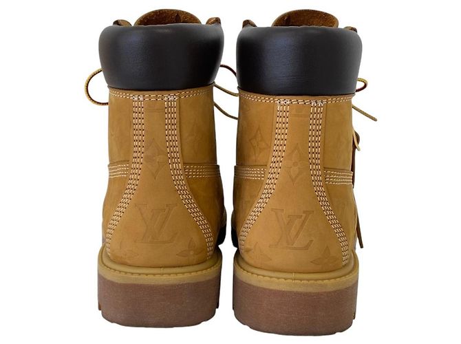 Botines Louis Vuitton Monogram Emboss 6IN - vista 5