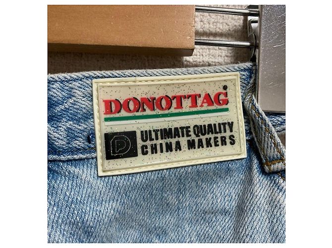 Autre Marque Pantalones de denim con recortes DONOTTAG - vista 7