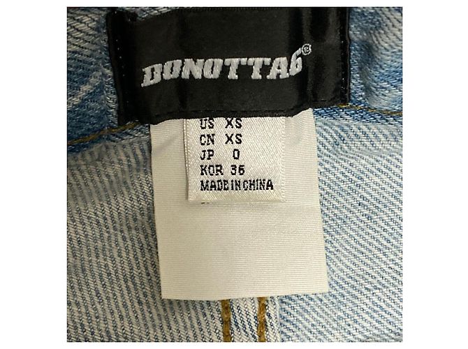 Autre Marque Pantalones de denim con recortes DONOTTAG - vista 8
