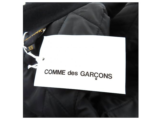 Abrigo de lana Deformed Design de COMME des GARCONS - vista 9