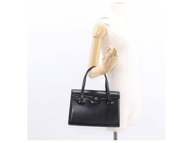 GIVENCHY Sac à main en cuir noir et or - vue 25