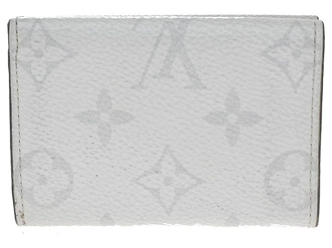 Louis Vuitton Discovery Monogram Taigarama Compact - vista 2
