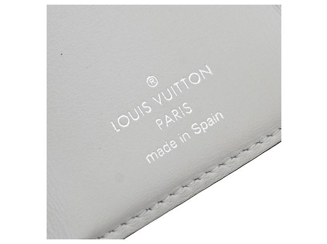 Louis Vuitton Discovery Monogram Taigarama Compact - vista 6