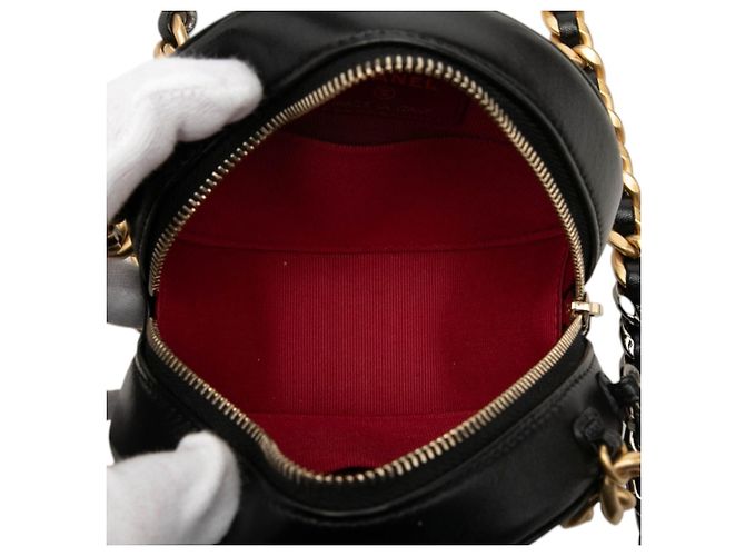 Clutch rotonda Chanel 19 in lambskin nero con catena - vista 4