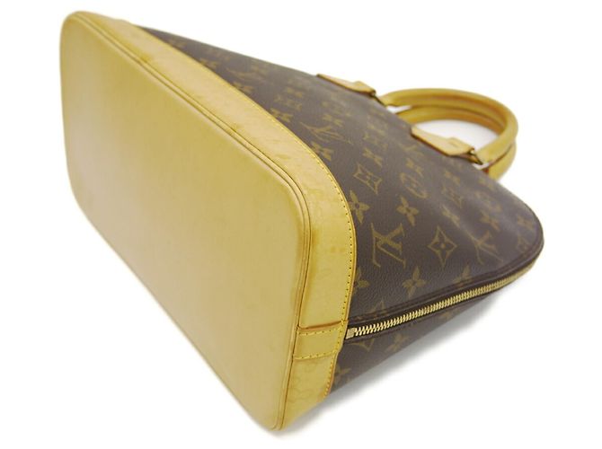 Bolso Louis Vuitton Alma Monogram - vista 5