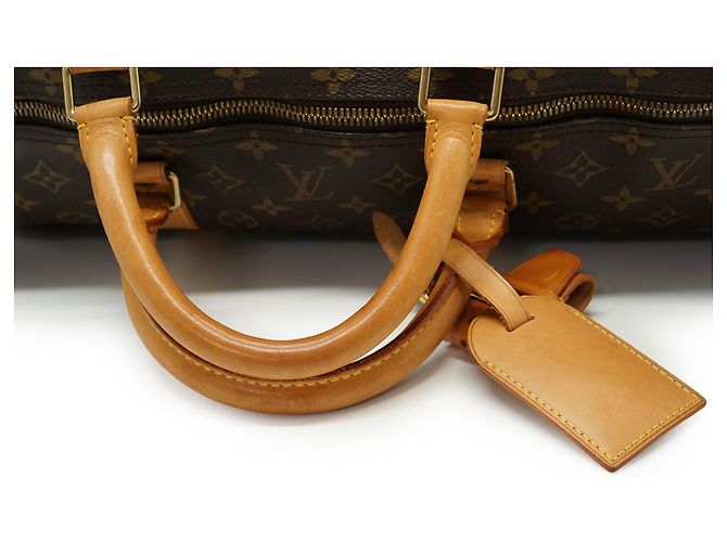 Louis Vuitton Monogram Keepall Bandouliere 60 - vista 12
