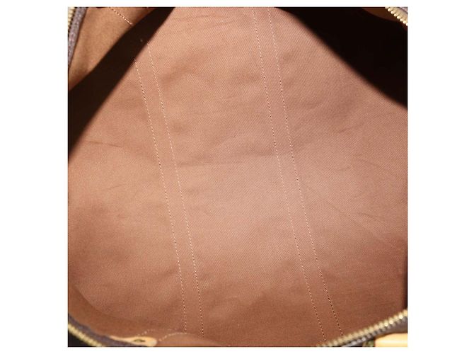 mala Louis Vuitton Monogram Canvas Keepall 60 - vista 7