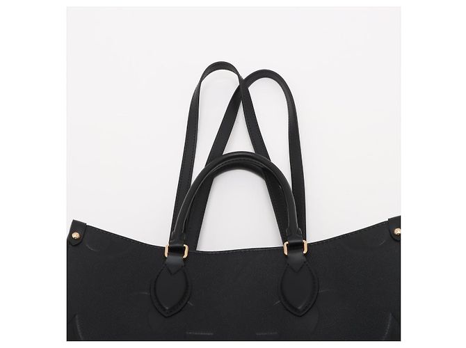 Louis Vuitton Borsa a spalla Onthego MM in pelle di vitello grana Empreinte Giant monogram - vista 8