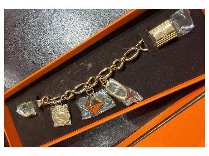 Hermès Ciondolo per borsa Olga in metallo dorato - vista 11