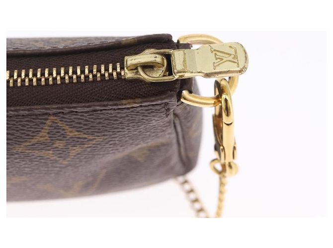 LOUIS VUITTON Monogram Giraffe Mini Pochette Accessoires M62087 Auth 210836SAM - Jerrillo - vista 9