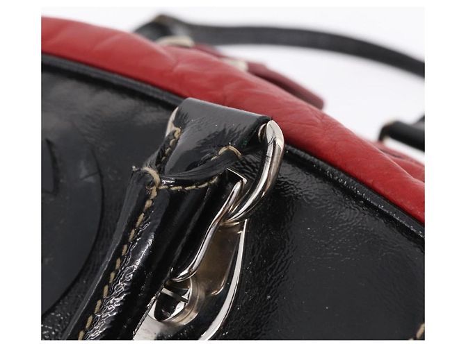 Sac à main GUCCI en cuir rouge argenté - vue 10