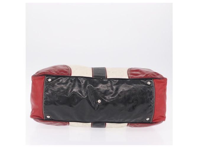 Sac à main GUCCI en cuir rouge argenté - vue 11