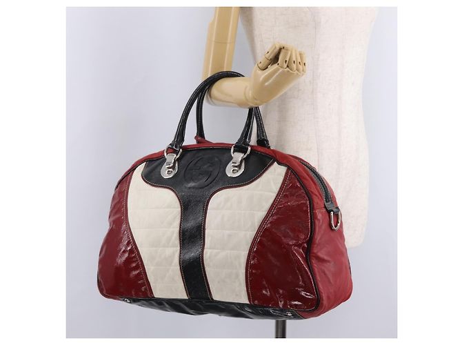 Sac à main GUCCI en cuir rouge argenté - vue 25