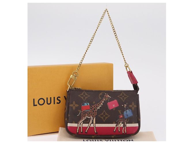 LOUIS VUITTON Monogram Giraffe Mini Pochette Accessoires M62087 - vista 12