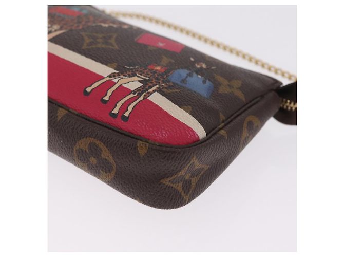 LOUIS VUITTON Monogram Giraffe Mini Pochette Accessoires M62087 - vista 16