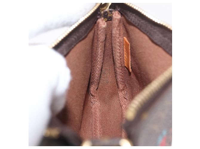 LOUIS VUITTON Monogram Giraffe Mini Pochette Accessoires M62087 - vista 21