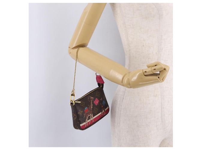 LOUIS VUITTON Monogram Giraffe Mini Pochette Accessoires M62087 - vista 22