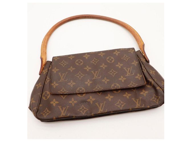 Borsa a tracolla Louis Vuitton Monogram Pochette NM in pelle marrone - vista 6