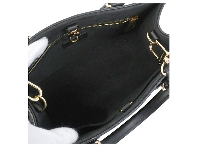 Bolso Louis Vuitton Monogram Empreinte OnTheGo PM - vista 4