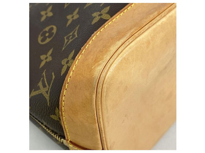 mala Louis Vuitton Alma Monogram - vista 6