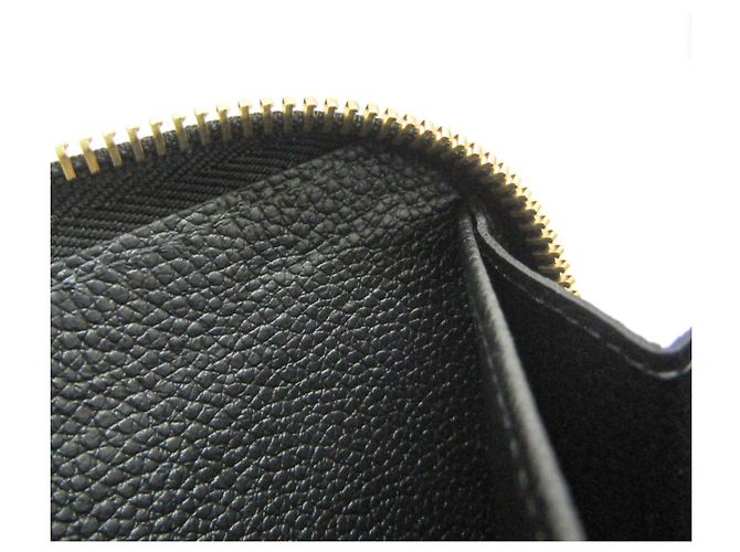 Portefeuille Zippy Monogram Empreinte Louis Vuitton - vue 10