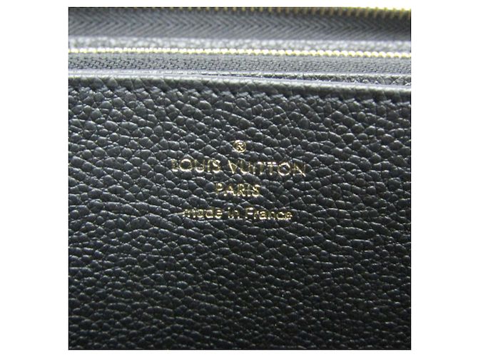 Portefeuille Zippy Monogram Empreinte Louis Vuitton - vue 11