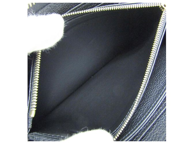 Portefeuille Zippy Monogram Empreinte Louis Vuitton - vue 5