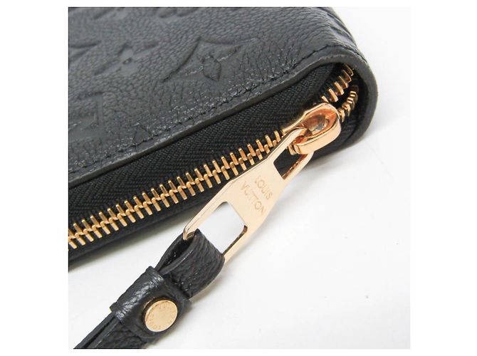 Portefeuille Zippy Monogram Empreinte Louis Vuitton - vue 9
