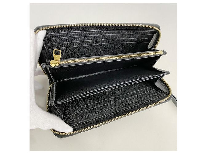 Portefeuille Zippy Monogram Empreinte Louis Vuitton - vue 3