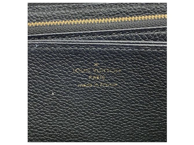 Portefeuille Zippy Monogram Empreinte Louis Vuitton - vue 4