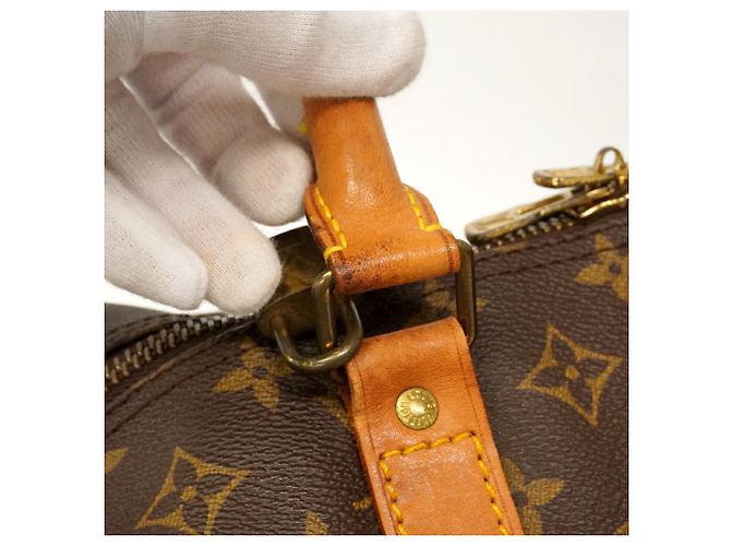 Louis Vuitton Boston Monogram Keepall Bandoulière 60 - vista 10