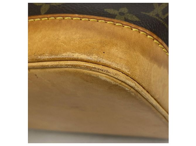 Bolso Louis Vuitton Alma Monogram - vista 6