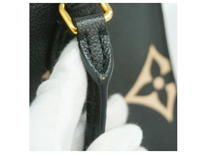 Borsa Louis Vuitton Monogram Empreinte Bicolor OnTheGo PM - vista 11