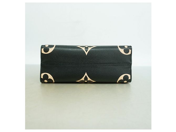 Borsa Louis Vuitton Monogram Empreinte Bicolor OnTheGo PM - vista 3