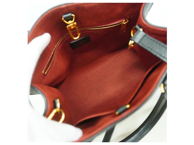 Borsa Louis Vuitton Monogram Empreinte Bicolor OnTheGo PM - vista 4
