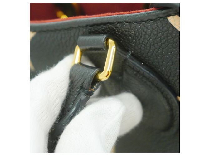 Borsa Louis Vuitton Monogram Empreinte Bicolor OnTheGo PM - vista 9