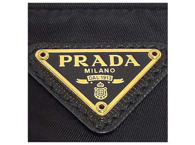Prada Bolso bucket crossbody de nylon con logo triangular Negro - vista 10