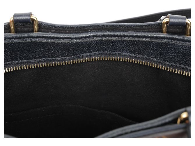 Louis Vuitton Borsa tote e a tracolla in tela Monogram e pelle MM Size Black - vista 31