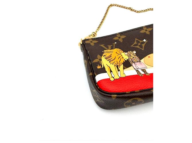 Louis Vuitton Mini Pochette Accessoires - vista 3
