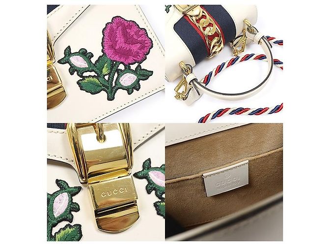Gucci Mini Top Handle in pelle bianca con ricamo fiore WEB - vista 7