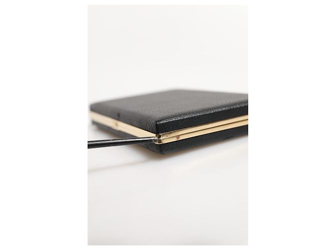 Dolce & Gabbana Clutch da sera in pelle nera con cornice dorata - vista 7